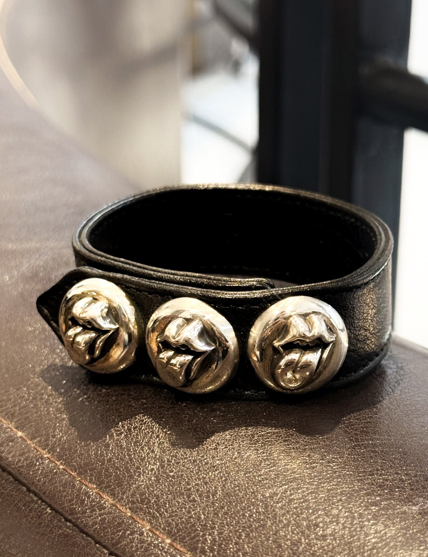 CHROME HEARTS ROLLING STONE LIP & TONGUE LEATHER BRACELET