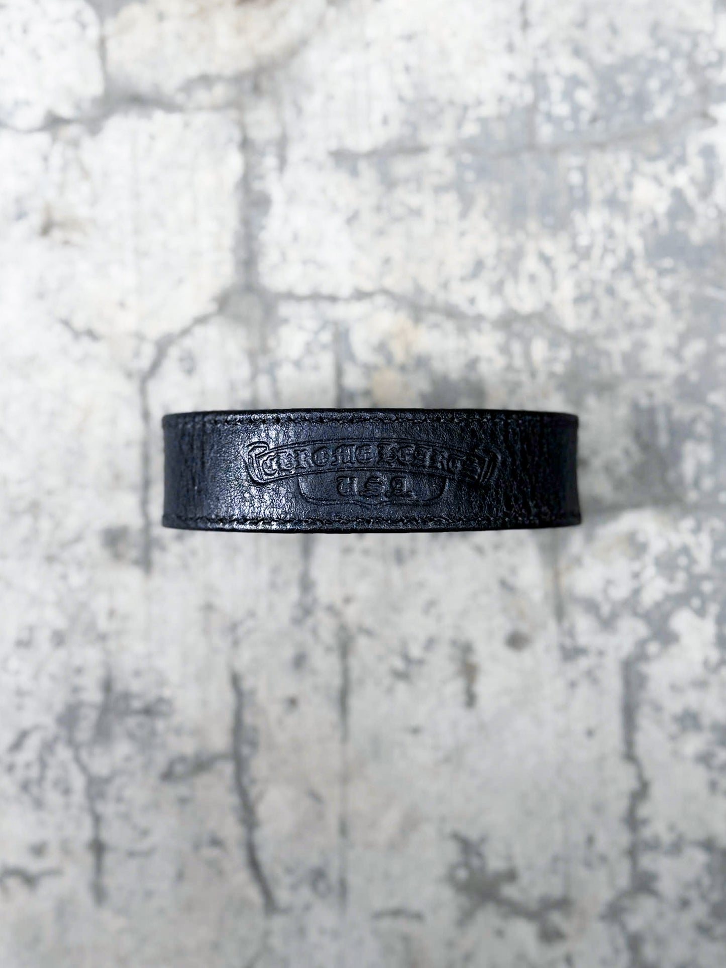 CHROME HEARTS ROLLING STONE LEATHER BRACELET